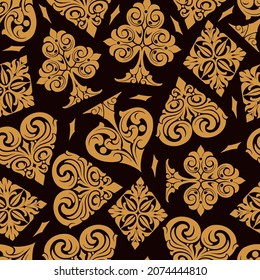 Vintage gambling seamless pattern with ornate card suits on dark background vector illustration