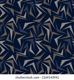 Vintage geometric seamless pattern in dark colors. Gray, brown, beige, striped angular shapes are randomly placed on a black background. Vector.