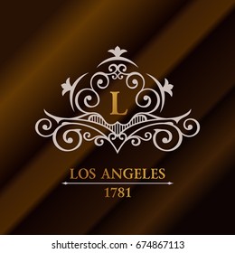 Vintage gold hipster label with lettering Los Angeles. Logo template for your sign, poster, clothing, badge. Vector calligraphic retro emblem L