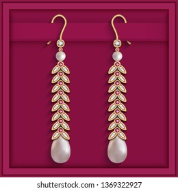 Vintage gold jewelry earrings with diamonds, pearl beads and ruby gemstones. Elegant women's jewellery decoration in open gift box.