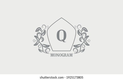 Vintage graceful floral monogram with initials Q. Heraldic logo symbol with exclusive calligraphic design elements in gray tones. Business sign, identity for hotel, restaurant, jewelry.