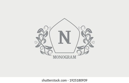 Vintage graziöse florale Monogramm mit Initialen N. Heraldisches Logo-Symbol mit exklusiven kalligrafischen Designelementen in Grautönen. Geschäftszeichen, Identität für Hotel, Restaurant, Schmuck.