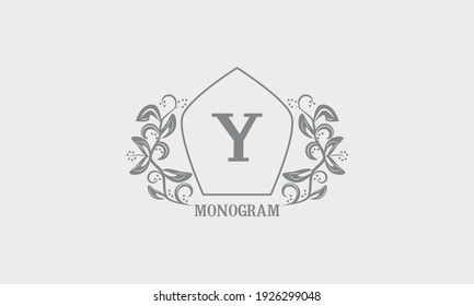 Monograma floral vintage elegante con las iniciales Y. Símbolo de logotipo heráldico con elementos de diseño caligráfico exclusivos en tonos grises. Cartel de negocios, identidad de hotel, restaurante, joyería.