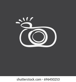 vintage graphic camera icon on black background, doodle hand drawn vector illustration