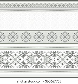 Vintage gray seamless  border on white. Ornate element for design. Ornamental lace pattern for invitations and greeting cards. Traditional floral decor.