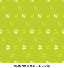 Vintage green background with grunge polka dots seamless pattern