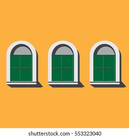 vintage green window on orange wall 