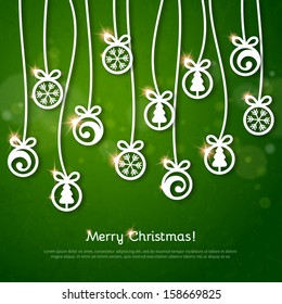 Vintage greeting card with Christmas balls on green background. Vector illustration.