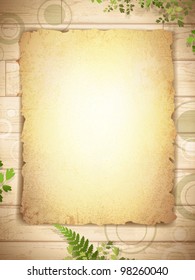 vintage grunge burnt paper at wooden background with floral decoration