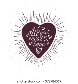 Vintage grunge hand lettering with heart and rays. Vector illustration.
