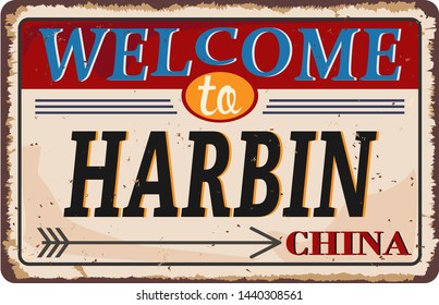 Vintage grunge Welcome to Harbin China rusted plate on white background