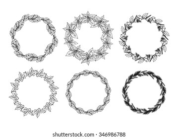 Vintage hand drawn christmas floral wreath set. Holiday frame with place for text. Black outline christmas plants. 