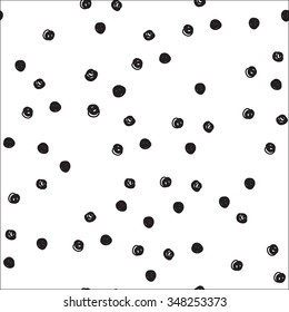 Vintage hand drawn doodle seamless pattern with black dots. Polka dot cute background. Design  for paper, wallpaper, textile, fabric, and other projects. 