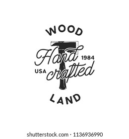 Vintage hand drawn woodworks logo and emblem. Wood land, hand crafted label. Typography lumberjack insignia with crossed axes and texts. Retro silhouette style. Stock vector illusration