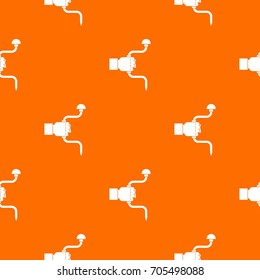 Vintage hand drill in man hand pattern repeat seamless in orange color for any design. Vector geometric illustration