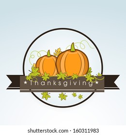 Vintage Happy Thanksgiving Day background with pumpkins and green maples leaves on blue background. 
