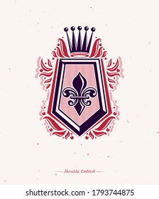 Vintage heraldic insignia made with monarch crown and lily flower royal symbol. Eco friendly product symbol, king quality theme illustration, protection shield.