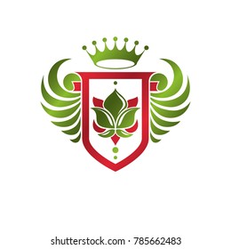 Vintage heraldic insignia made with monarch crown and lily flower royal symbol. Eco friendly product symbol, king quality theme illustration, winged protection shield created with cartouche.