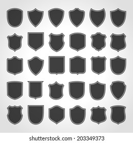 Vintage heraldic shield shapes labels design. Retro style borders, frames, labels set. 