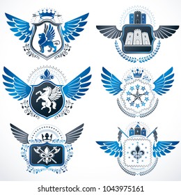 Vintage heraldry design templates, vector emblems created with bird wings, crowns, stars, armory and animal illustrations. Collection of vintage style symbols.