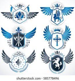 Vintage heraldry design templates, vector emblems created with bird wings, crowns, stars, armory and animal illustrations. Collection of vintage style symbols.