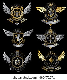 Vintage heraldry design templates, vector emblems created with bird wings, crowns, stars, armory and animal illustrations. Collection of vintage style symbols.