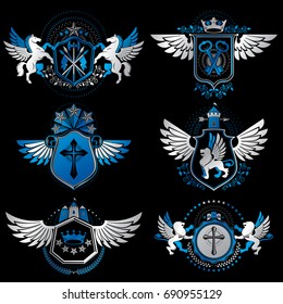 Vintage heraldry design templates, vector emblems created with bird wings, crowns, stars, armory and animal illustrations. Collection of vintage style symbols.