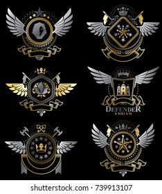 Modelos de diseño herálico vintage, emblemas vectoriales creados con alas de pájaro, coronas, estrellas, armería e ilustraciones animales. Colección de símbolos de estilo vintage.
