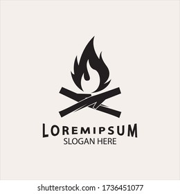 vintage Hipster bonfire Campfire logo badge label vector illustration on dark background. Crossed logs of wood and fire flame Classic badge
