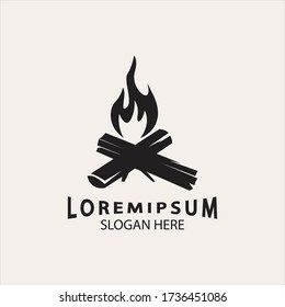 vintage Hipster bonfire Campfire logo badge label vector illustration on dark background. Crossed logs of wood and fire flame Classic badge