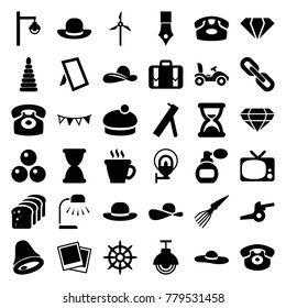 Vintage icons. set of 36 editable filled vintage icons such as perfume, desk phone, gem, coffee, woman hat, ink pen, helm, tv, luggage, party flag, photo, street lamp, sun hat