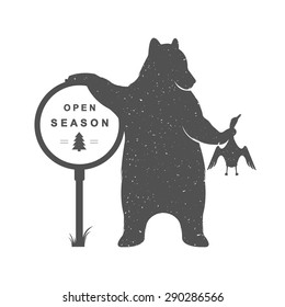 Vintage Illustration bear with duck - Grunge effect. Funny bear hunter isolated on a white background for posters, T-shirts and hunting clubs.