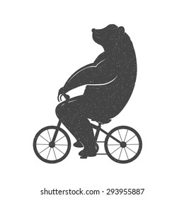 Vintage Illustration bear on a bike with Grunge effect. Funny bear ride a bicycle on a white background for posters and T-shirts.