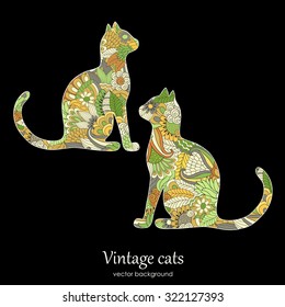 Vintage illustration with isolated ethnic patterned cat on the black background
