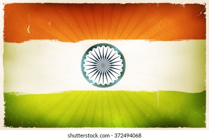 Vintage India Flag Poster Background/
Illustration of an india country flag poster, red, white and green, with retro and vintage design, grunge textures and sunbeams, for indian national holidays