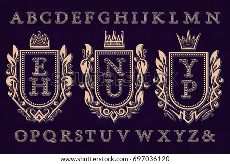 Vintage initial logos kit. Coat of arms frames, patterned letters, isolated alphabet.