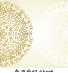 Vintage invitation card with round Indian ornament.