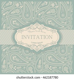 Vintage Invitation or wedding card with Paisley pattern and elegant floral elements in beige and green