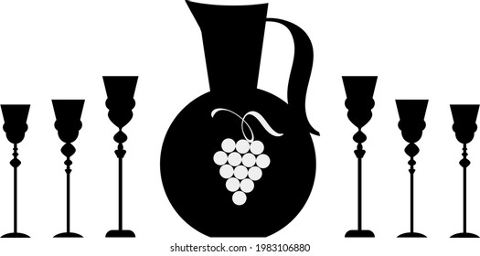 vintage jug with a bunch of grapes and wine glass
