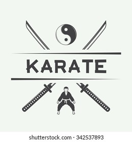 Vintage karate or martial arts logo, emblem, badge, label and design elements. Vector illustration