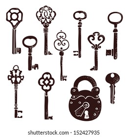 Vintage keys and lock on a white background