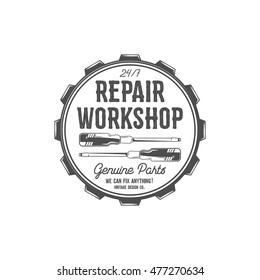 Vintage label design. Repair workshop patch in old style with screwdrivers. Use for repair station, car service logo, badge, insignia. Retro monochrome design. Vector stamp