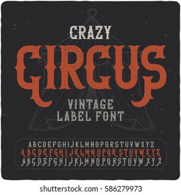 Vintage label font named "Crazy Circus". With illustration of circus tent on the background.