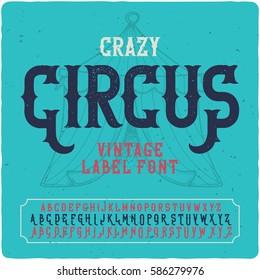 Vintage label font named "Crazy Circus". With illustration of circus tent on the background.