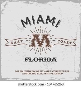 vintage label with Miami monogram