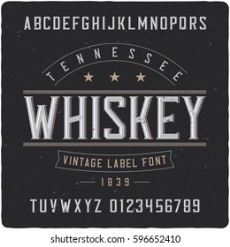 Vintage label typeface named "Tennessee Whiskey". Good handcrafted font for any label design.