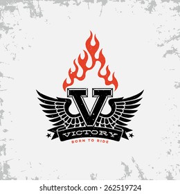 Vintage label with wings, flame, letter V and ribbon on grunge background for t-shirt print, poster, emblem. Vector illustration.