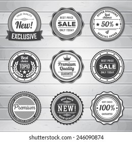 Vintage Labels template set. Retro badges for your design on wooden background. Vector illustration.