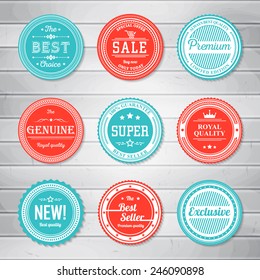 Vintage Labels template set. Retro badges for your design on wooden background. Vector illustration.