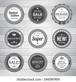 Vintage Labels template set. Retro badges for your design on wooden background. Vector illustration.